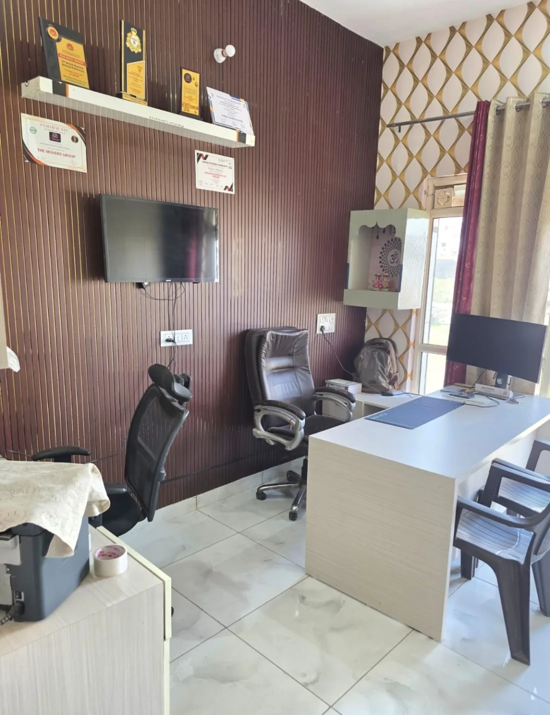 Gurugram office desk at 250 Kherki Road where GST quotes are written