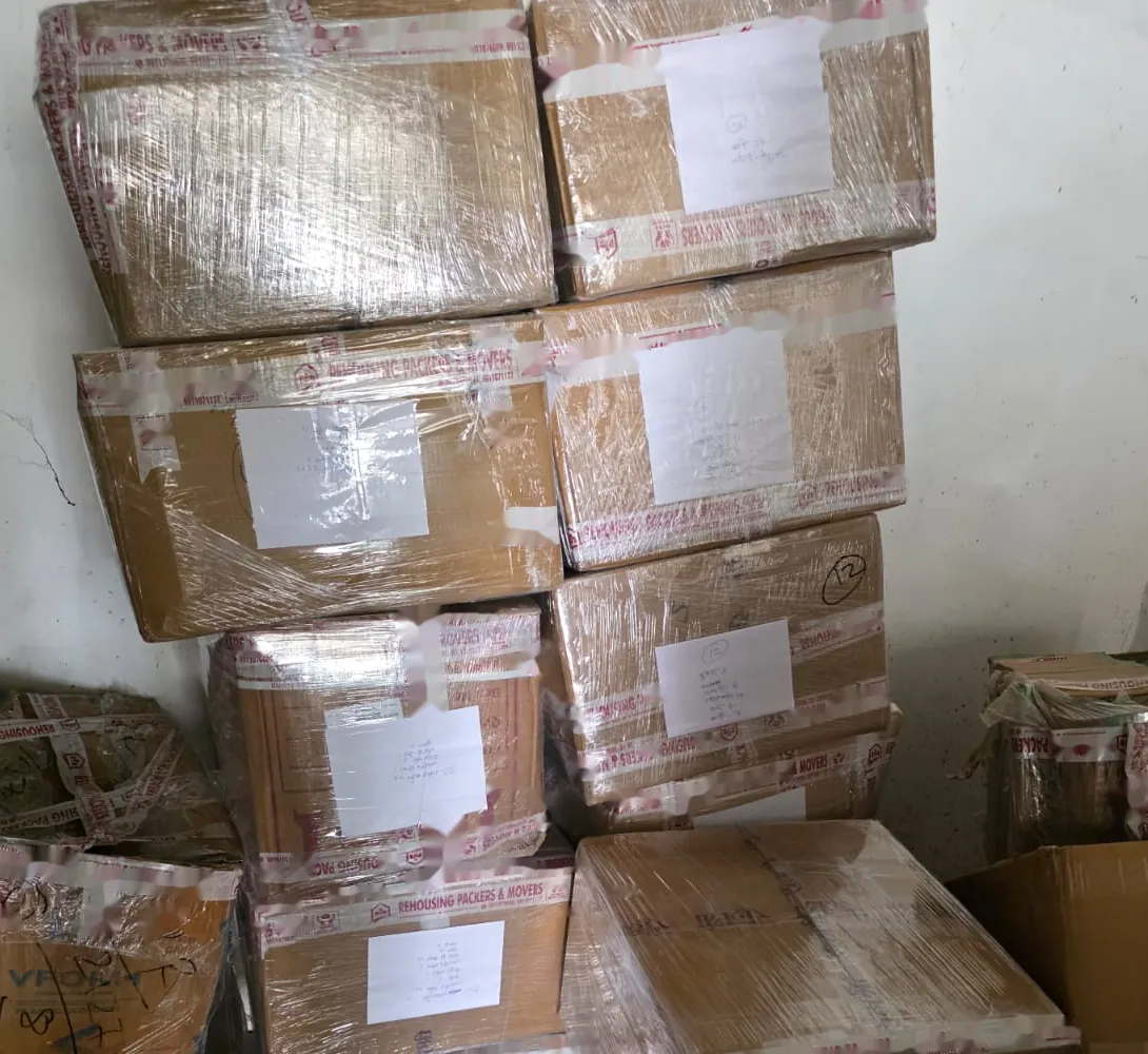 Pallet of numbered household boxes in storage
