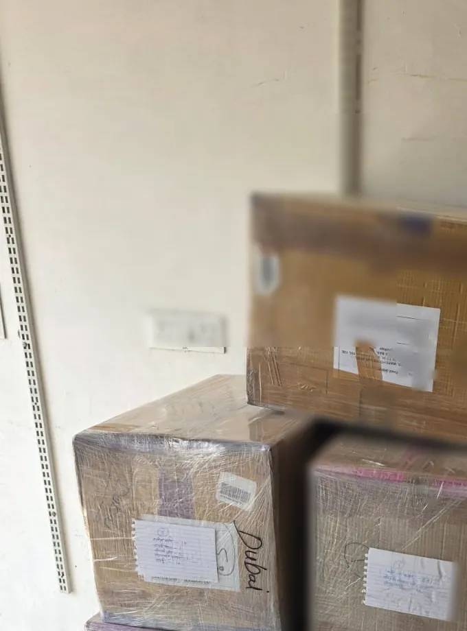 Cartons in stretch wrap for an NCR household move